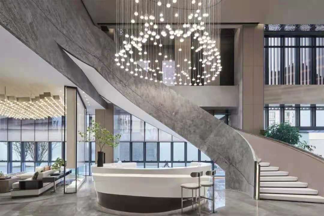 ArchiNova Materials Advanced Stone Systems curved staircase in a Shanghai luxury residential estate